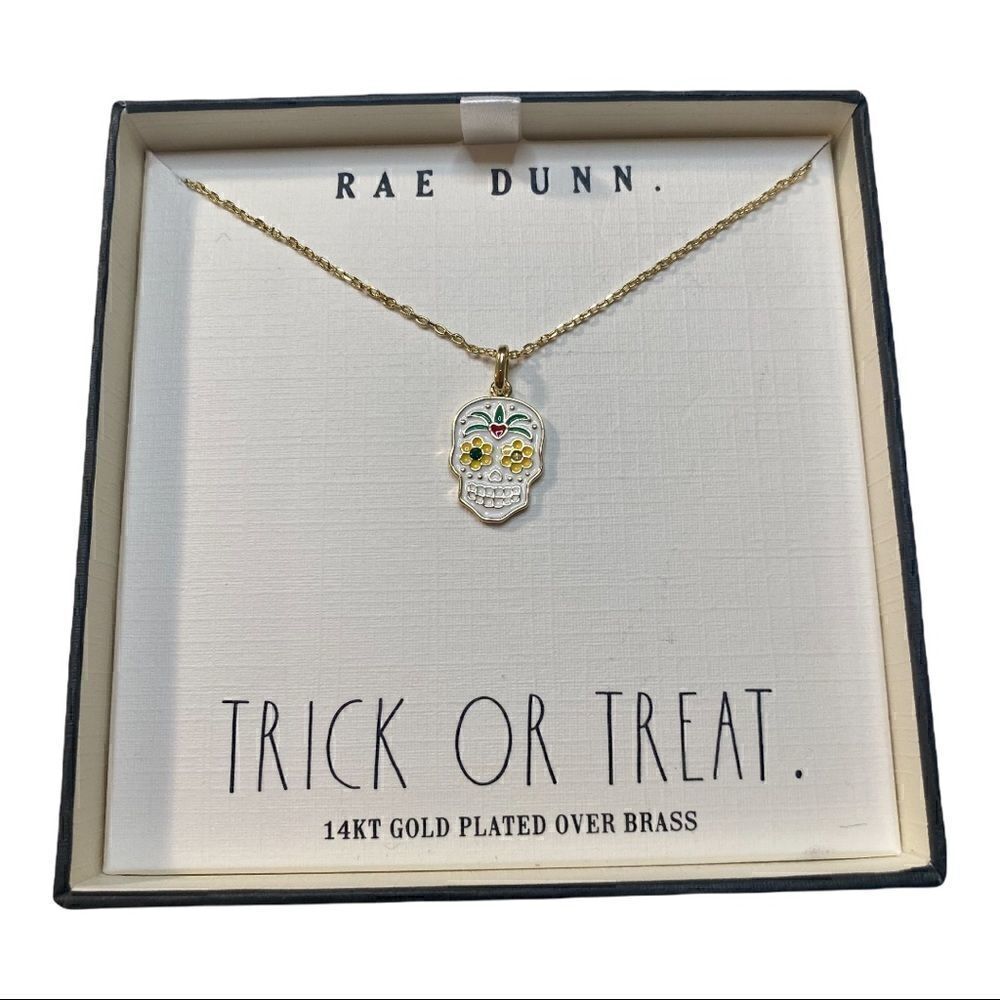 Rae Dunn Sugar Skull Necklace on delicate gold toned chain.